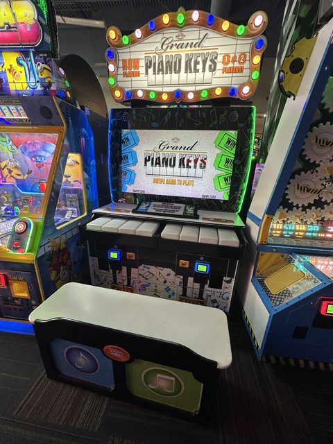 Grand Piano on the GameTime game floor