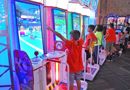 A youth group lined up at the game floor at GameTime